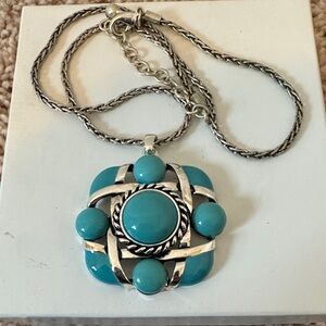 Elegant Silver and Turquoise Pendant Necklace